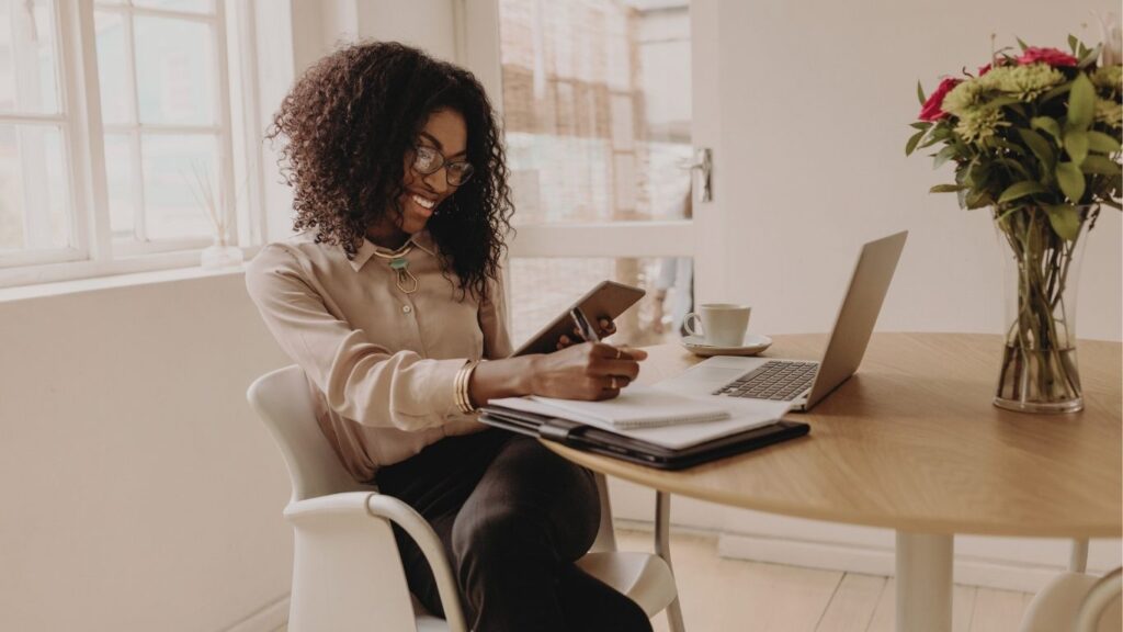 A professional coach facilitating a session using holistic wellness frameworks to identify client blocks.